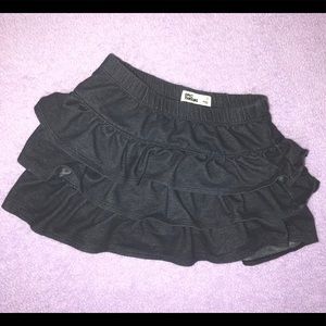 Dark blue ruffled skirt with built in shorts